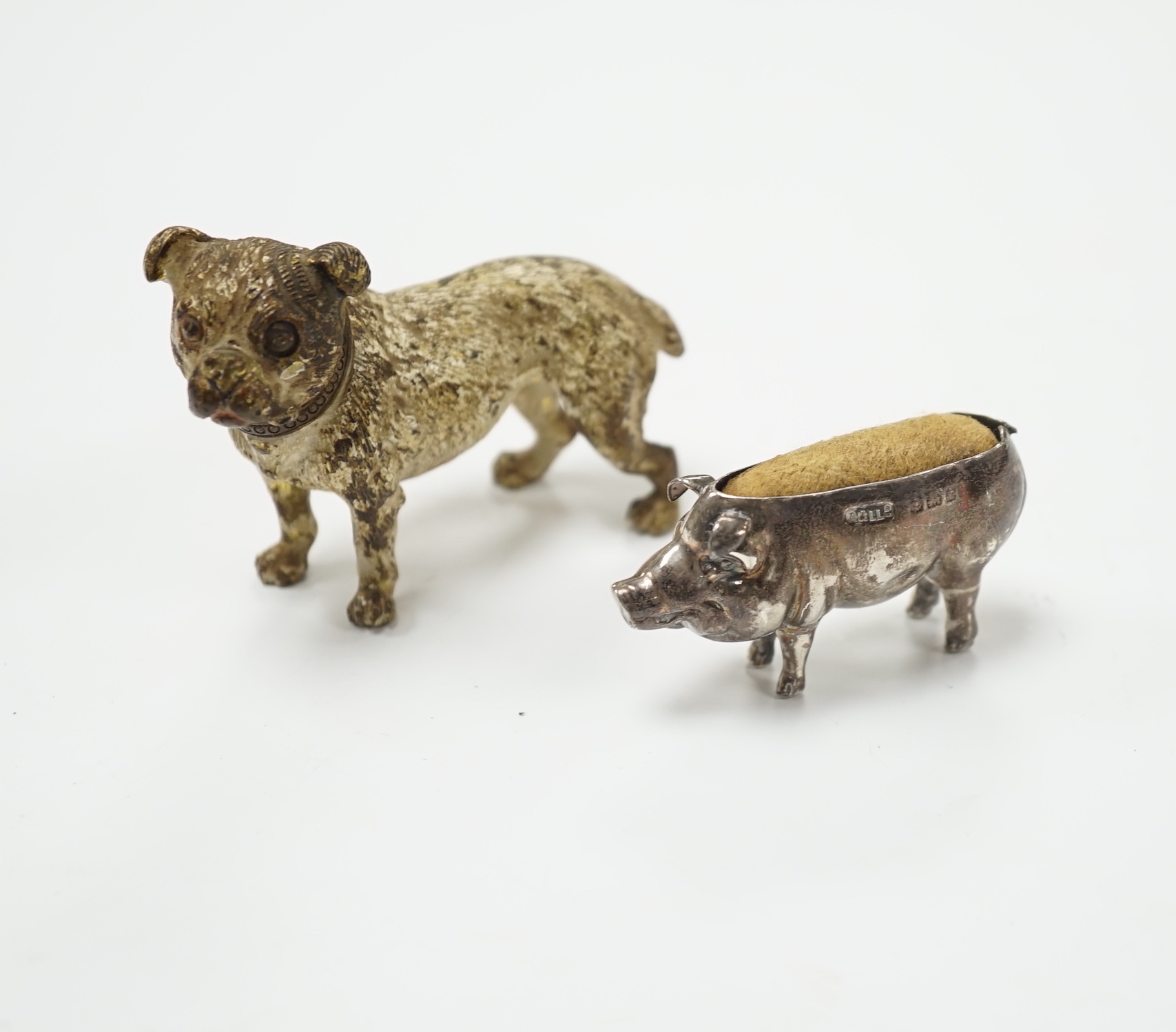An Austrian cold painted dog, silver pig pin cushion, Adie & Lovekin, largest 6.5cm wide